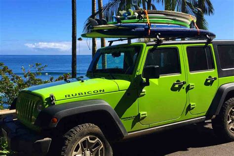 This mount can hold up to two SUP boards up to 36" wide and uses integrated rollers to make loading and unloading a snap so you can get out there and enjoy the water. . Jeep wrangler surfboard rack